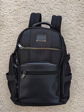 dolton flap backpack leather DLC BUFFALO grab option while the shoulder straps distribute weight for daily use Black Leather Professional Laptop Backpack